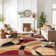 Mehul Geometric Multi Colored Area Rug in Red/Brown/Black