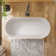 55.1"L x 27.6 "W x 22.8"H Solid Surface Freestanding Oval Tub with Overflow and Drain