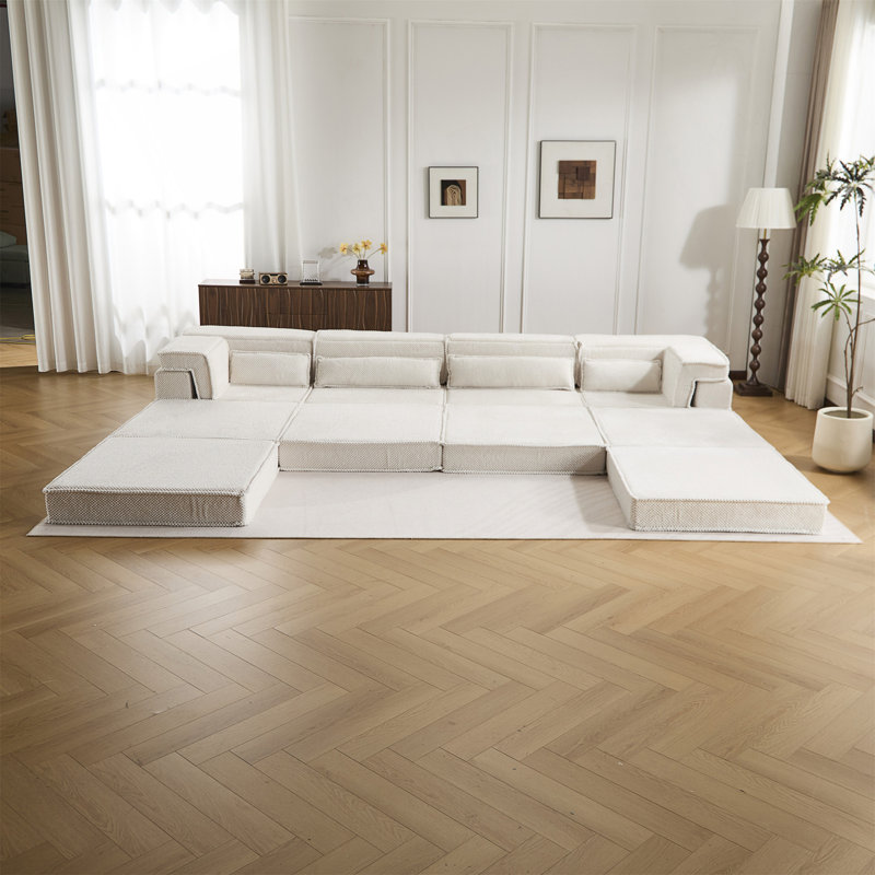 Canapé-lit convertible au sol avec une conception modulaire, aucun assemblage requis, de la mousse à mémoire de forme à haute densité et un tissu polaire doux pour un confort ultime.