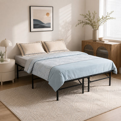 Black Metal Folding Bed Frame (Queen Size) — Features ample under-bed storage space and thickened steel slats for robust load-bearing support.