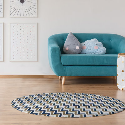 Tapis rond beige / bleu marine à motif géométrique