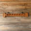 Rustic Wooden Wall Hanger with Iron Accents