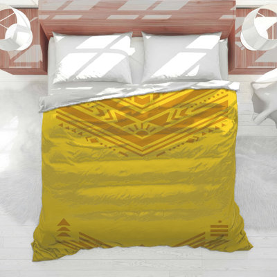 Édredon jaune à motif géométrique