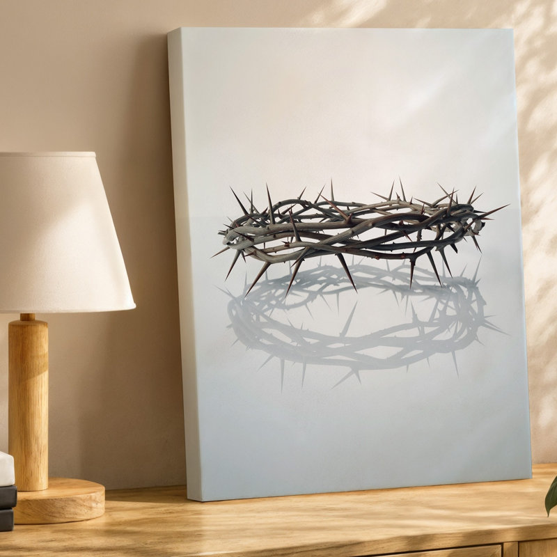 Toile d'une composition minimaliste avec une couronne délicate d'épines, art mural complexe tissé avec des bords pointus pointus reposant sur une toile