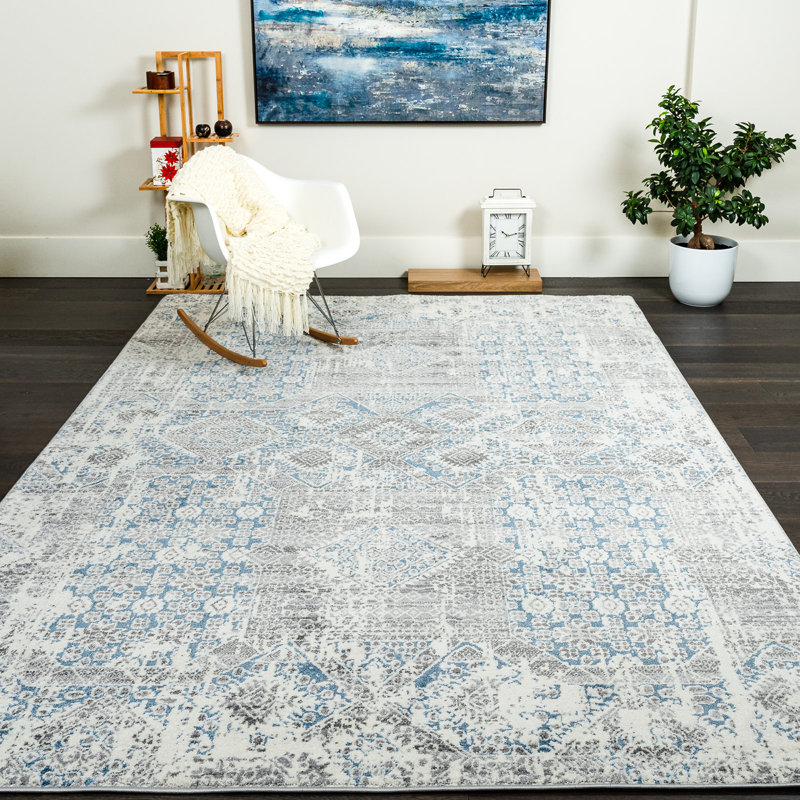 Tapis bleu à motif abstrait 6 pi 7 po x 9 pi 6 po Coyner