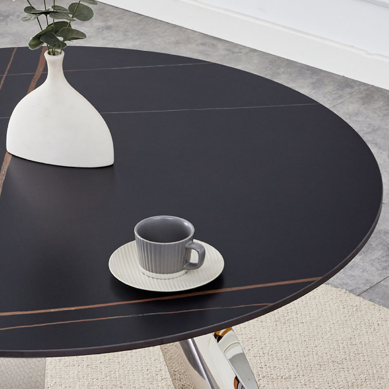 42-Inch Black Sintered Stone Round Table with Stainless Steel Legs and White PU Leather Dining Chairs