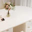 Table à manger ovale simple de style crème et chaise-105492342