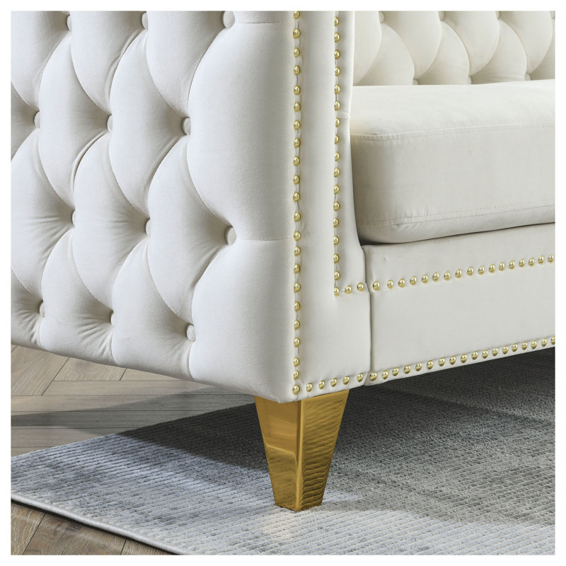 Canapé luxueux en velours beige avec accoudoirs carrés touffetés, canapé rembourré moderne avec pieds en métal doré pour le salon