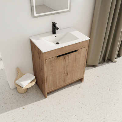 30" Freestanding Bathroom Vanity With White Ceramic Sink & 2 Soft-close Cabinet Doors. Modern Style, Imitative Oak Color. Plywood Construction. Adjustable Shelf Included. Easy To Clean And Maintain