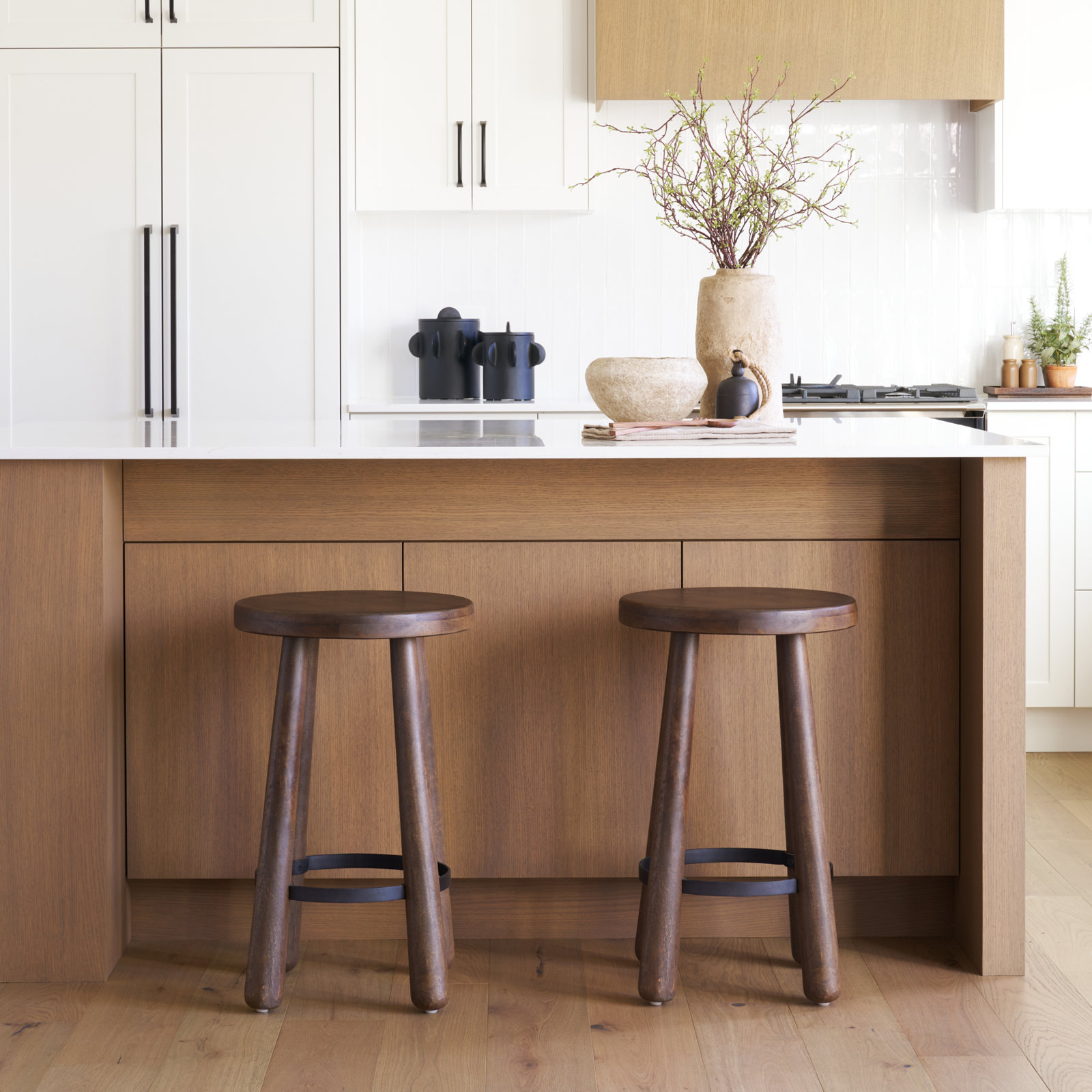 Oxley Solid Wood Stool with Dark Brown Finish and Matte Black Metal Footrest