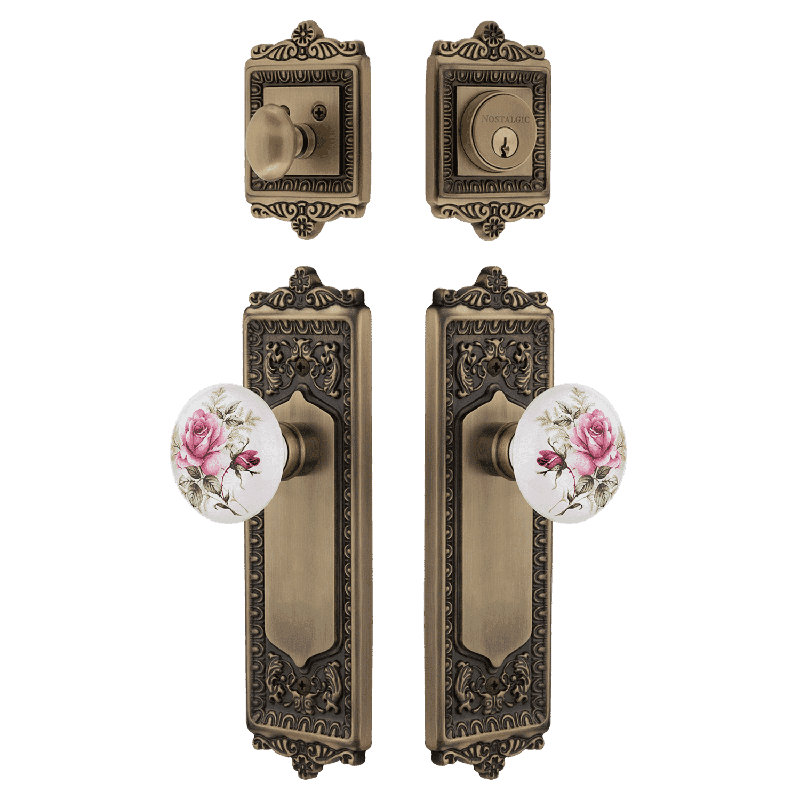 Nostalgic Warehouse Egg & Dart Entry Set with White Rose Porcelain Knob, Antique Brass, 2.75