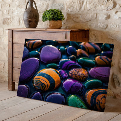 Canvas A Vibrant Collection Of Smooth Rounded Pebbles In A Variety Wall Art Of Colors Including Deep Purples Bright Oranges And Rich Canvas Wall Art