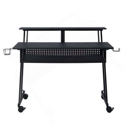 Bureau de studio noir avec plateau pour clavier