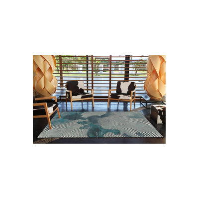 Tapis bleu tissé lavable à la machine
