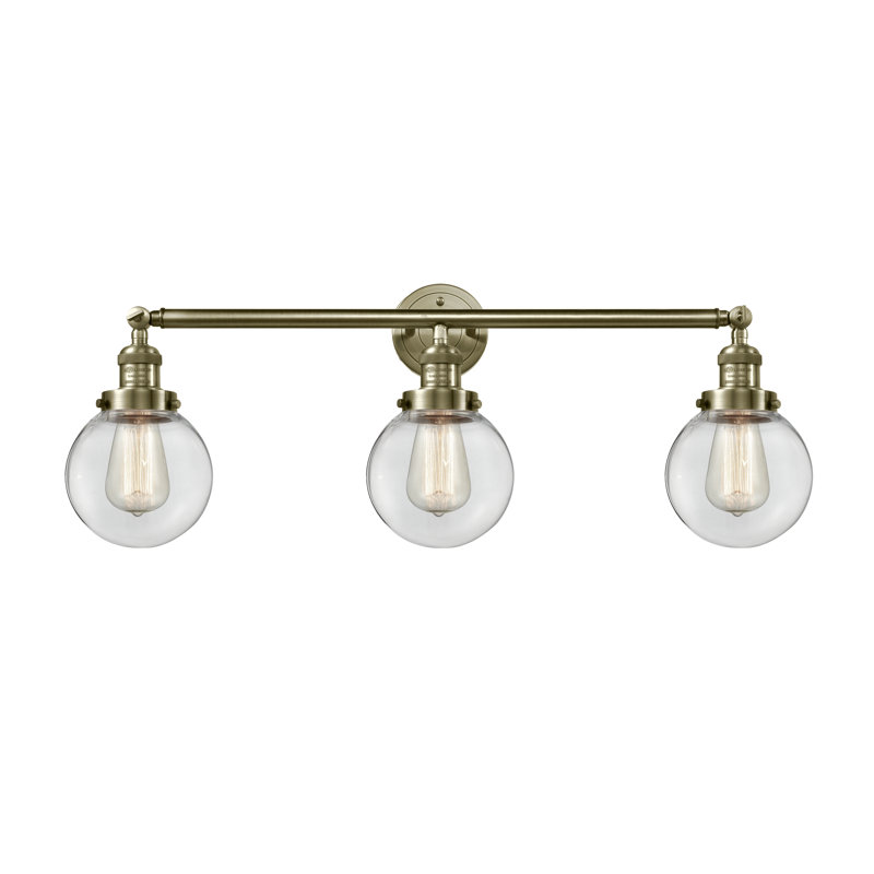 Éclairage pour salle de bain 3 lumières Lorri, Laiton antique, DEL, Transparent