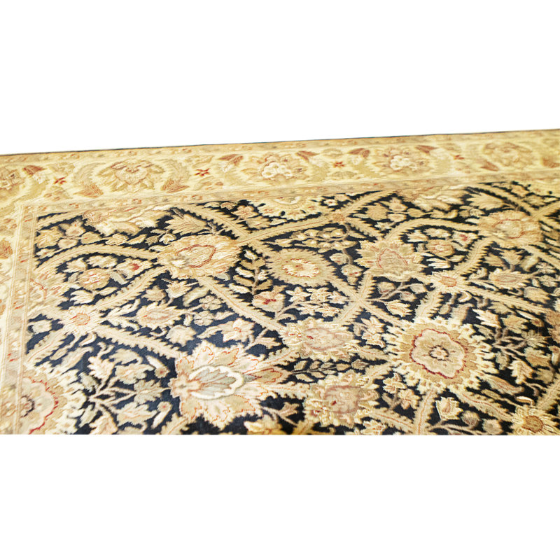 Hand Knotted Wool Area Rug in Black And Gold