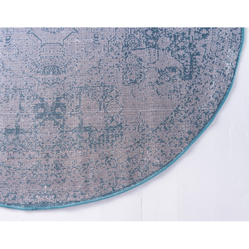 Tapis turquoise à motif géométrique Rizo, Rond 8 pi