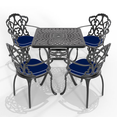 5-Piece Black Cast Aluminum Outdoor Dining Set, Patio Furniture With 30.71 In. Square Table And Random Color Cushions -  Bloomsbury Market, F845BD00E3D04C769F5574E4EBA0E21D