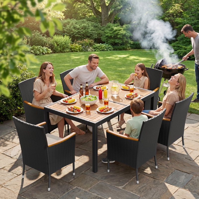 Callan 6 - Person Acacia Wicker Patio Dining Set with Rectangular Table , Cushions Included, Black