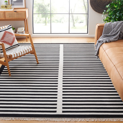 Delia Ivory/Black Area Rug