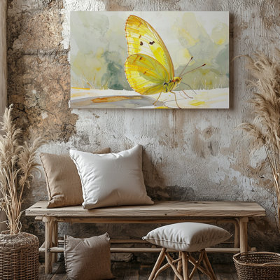 A lumière et joyeux papillon à l'aquarelle peinte dans des tons de jaune doux avec toile blanche, qualité supérieure prête à être accrochée