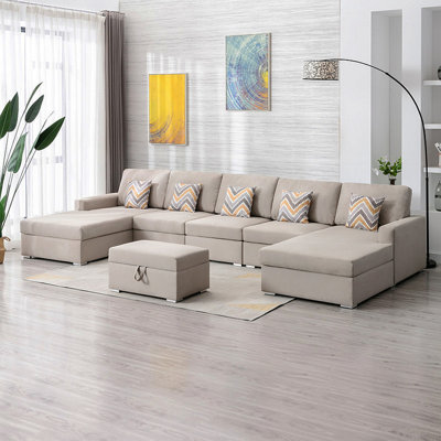 Canapé modulaire double en lin 6 pièces avec pattes interchangeables, repose-pieds et coussins Nolan