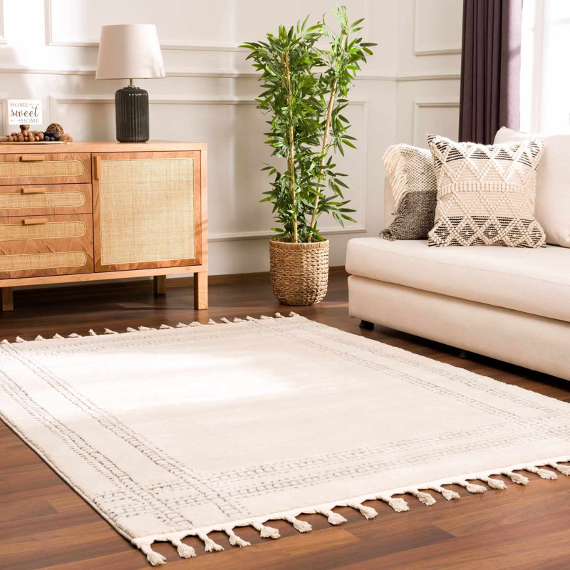 Javyion Moroccan Machine Woven Polypropylene Area Rug in Cream, Rectangle 5'3" x 7'
