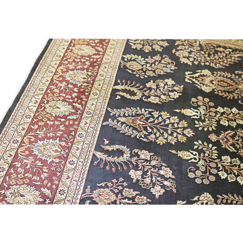 Tapis noir et rouge noué à la main de haute qualité