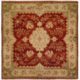 Dumka Wool Oriental Area Rug in Rose Chenille