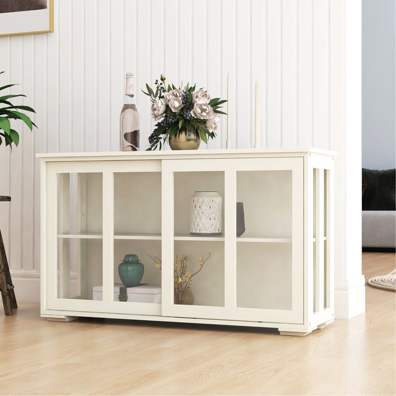 White Kitchen Storage Cabinet With Glass Door. Solid Construction For Reliable Performance. 2 Sliding Doors And Adjustable Shelf Maximized Storage. Painting. Non-Slip Base To Keep In Place E1 Grade