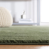Tapis uni en polyester tissé à la machine en vert