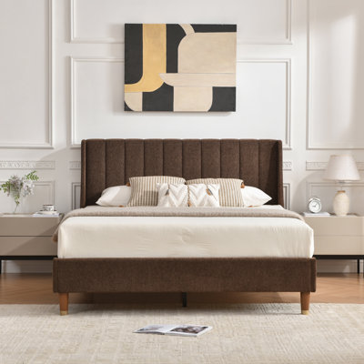 Linvel Upholstered Wingback Platform Bed