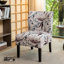 Fauteuil en tissu imprimé avec motif floral mauve - Espace de vie moderne, assise confortable et sans accoudoirs