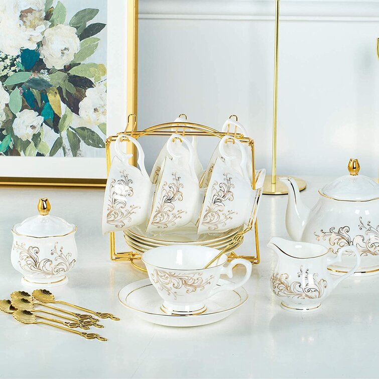 https://assets.wfcdn.com/im/75284300/resize-h755-w755%5Ecompr-r85/1784/178485882/C%26g+Outdoors+71oz.+Floral+Teapot.jpg