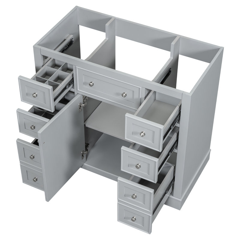 Meuble-lavabo 36 po sans lavabo, gris. Base d'armoire à 1 et 6 tiroirs. Bois véritable et imperméable, teinté. Rangement suffisant. Style moderne. Autoportant. Assemblage requis seulement. Matériau solide.
