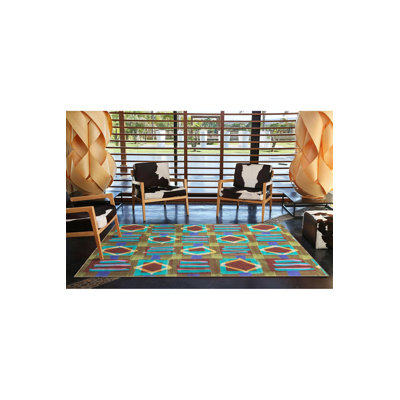 Tapis bleu lavable à motif de cubes tissés