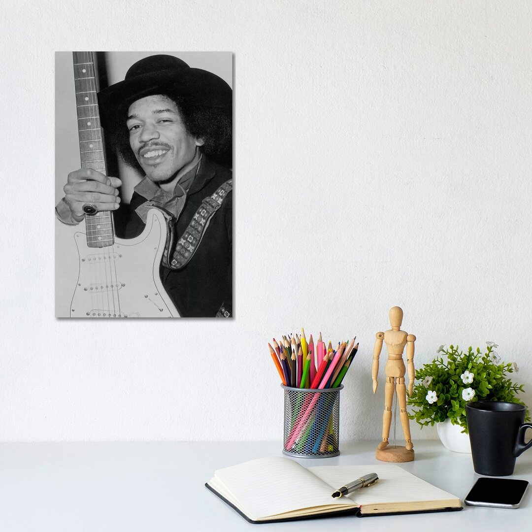 Leinwandbild A Smiling Jimi Hendrix Holding His Guitar von Radio Days