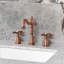 Robinet de salle de bain espacé à 2 poignées et 3 poignées à fixation sur le comptoir avec bonde escamotable Kingston Brass Essex-110561888
