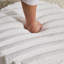Repose-pieds rembourré en fausse fourrure-760395935