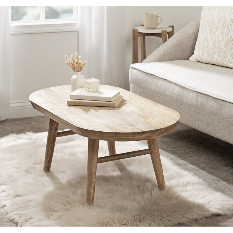 Berenike Oval Coffee Table with Tapered Legs | Wayfair