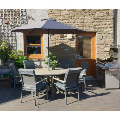 VanVleet 6 - Person Patio Dining Set with Round Table , Cushions Included