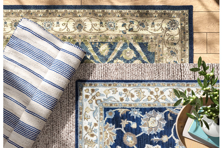 rugs layered over rugs
