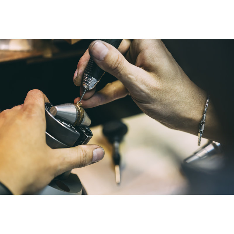 Jeweller Working On A Ring by Nd3000 - Wrapped Canvas Print, 81cm H x 122cm W