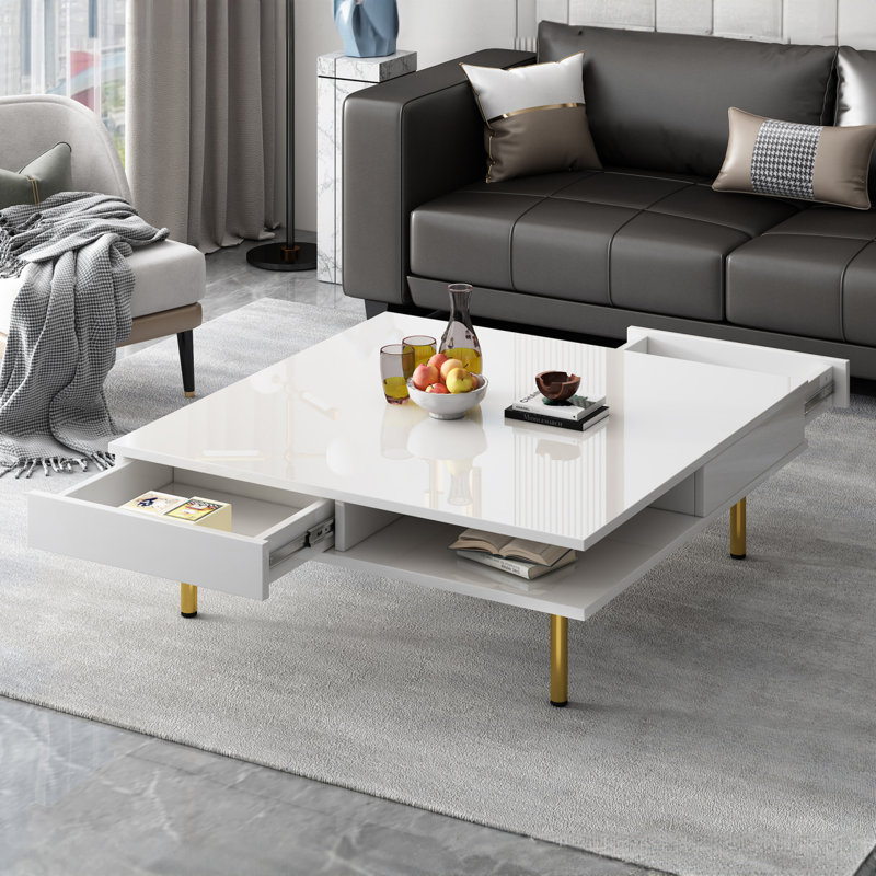 Table basse ON-TREND Exquise à haute brillance avec 4 pieds dorés et 2 petits tiroirs, Blanc