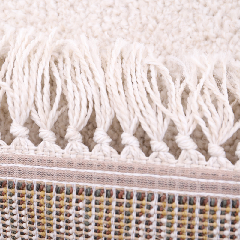Clyburn Tufted Beige Rug