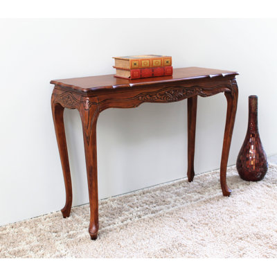 Arvinjot Hand Carved Console Table by Lark Manor