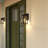  Sutton 9.5 in. H 1-Light Matte Black Contemporary Outdoor Wall Sconce made of Durable Steel, Clear Seeded Glass, LED Compatible, Use for Exterior Porch Patio Front Door or Garage-1005475636