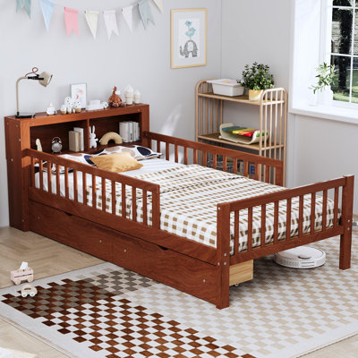 Lit simple taille rose avec coffre-fort et compartiments de rangement