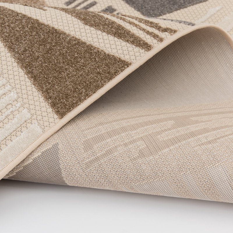 Ivory and Taupe Geometric 5' x 7' Synthetic Area Rug
