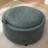 Savinien Upholstered Round Storage Ottoman-873350182